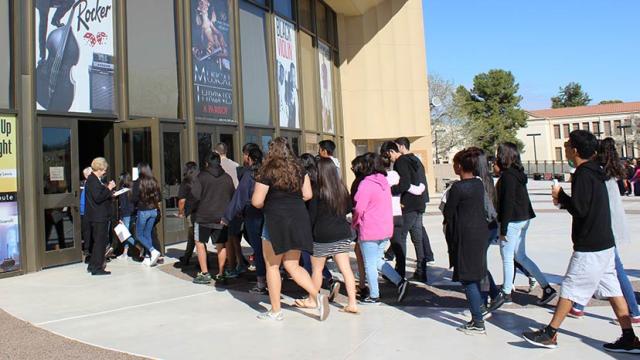 Students entering the CCA for a performance