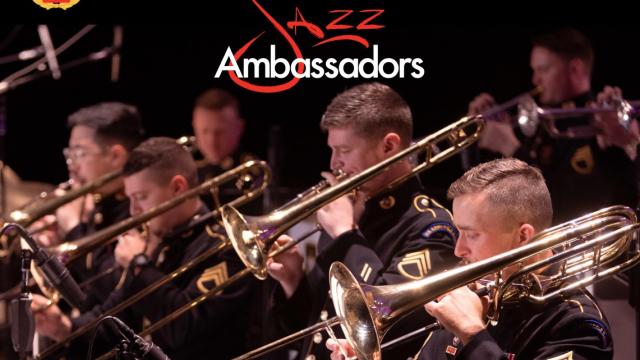 men playing trombones wearing dark uniforms