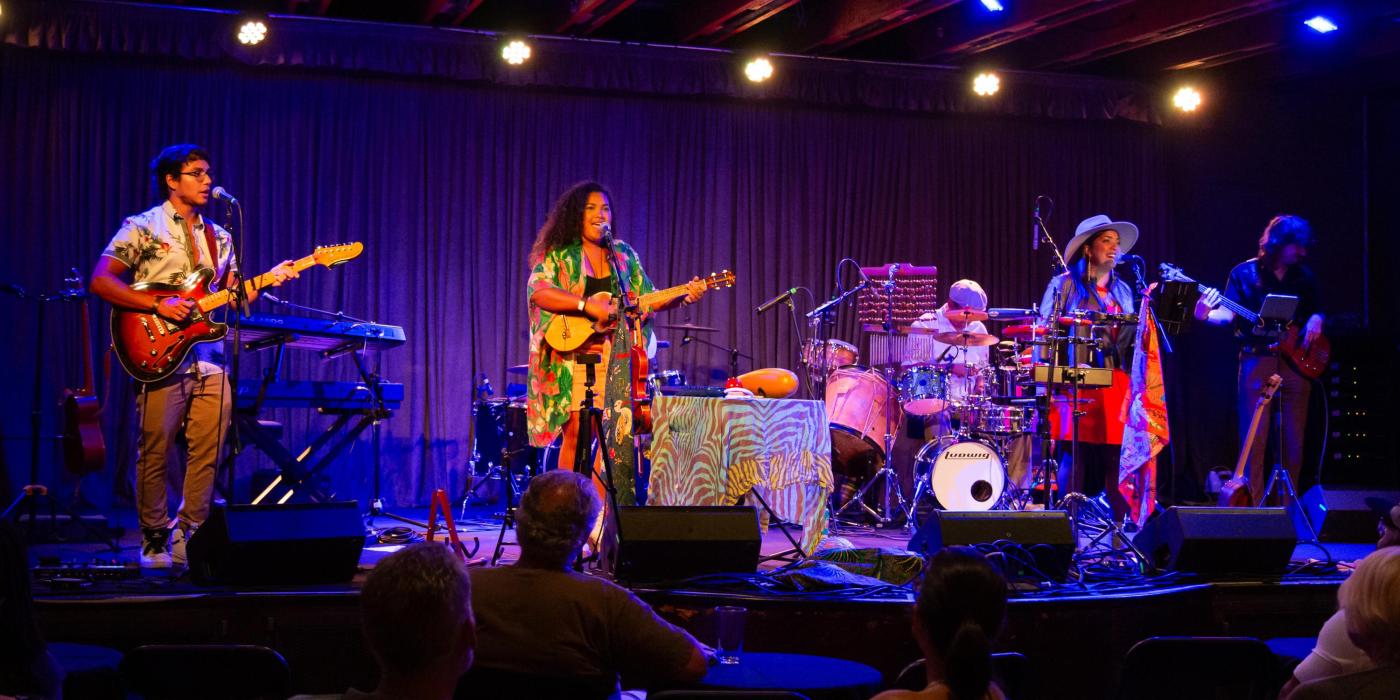 Medio Pinto performing on stage