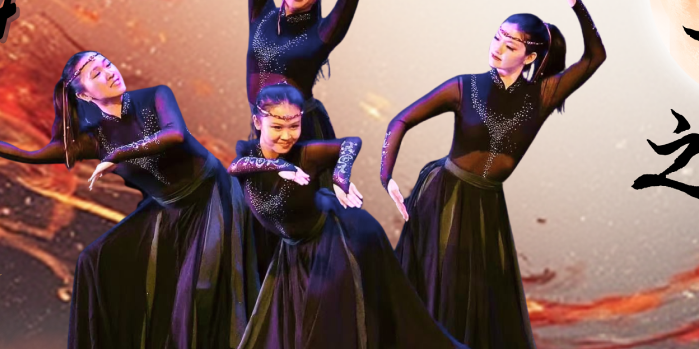 Four Chinese dancers dressed in all black, posing on stage