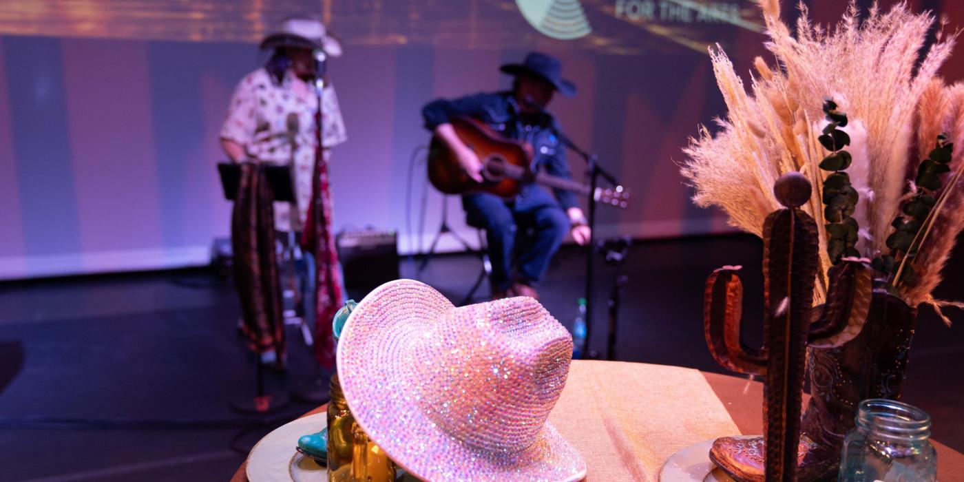 The Blindside Duo plays behind a western centerpiece