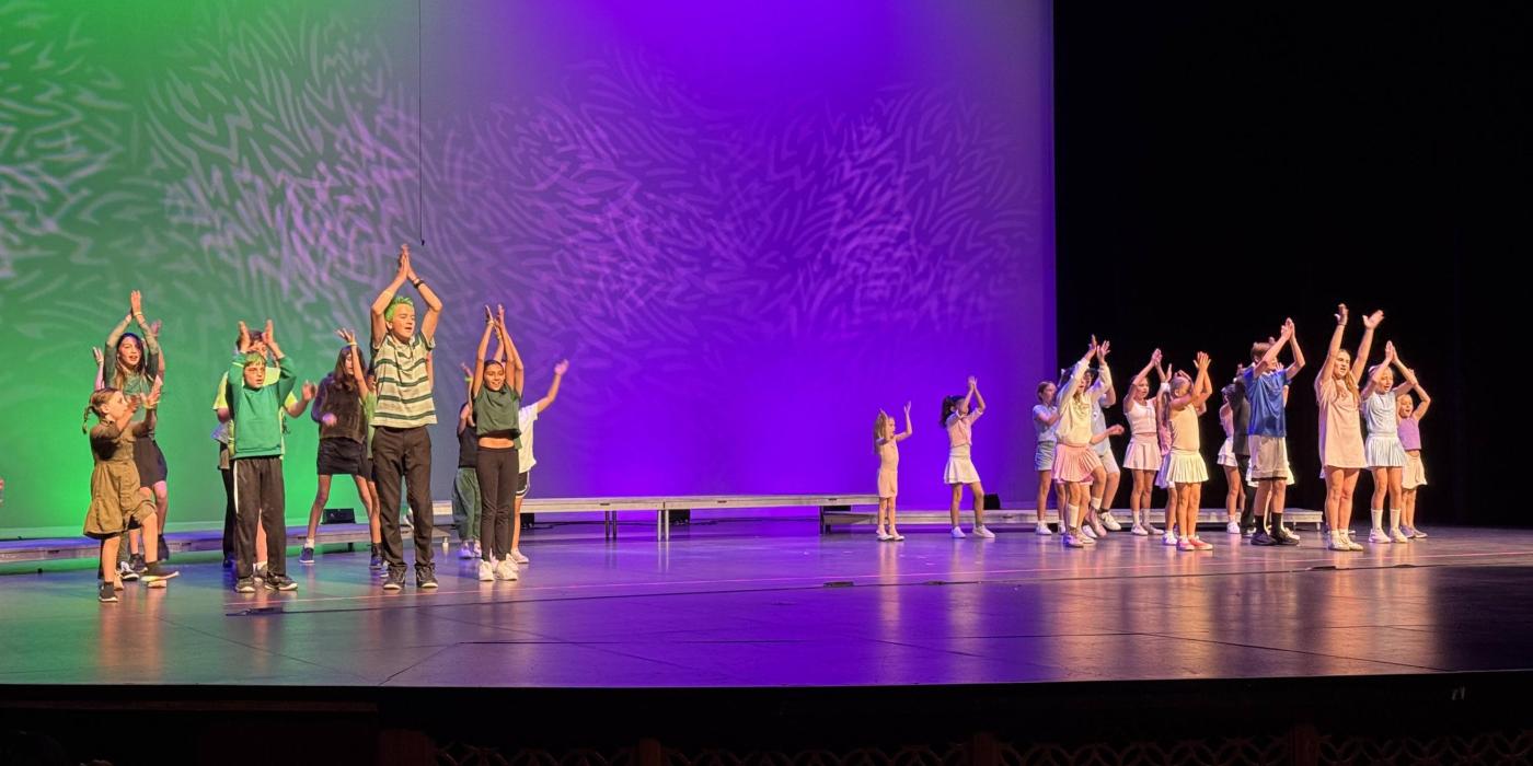 Camp kids performing Hamilzombies on the Mainstage Summer 2025