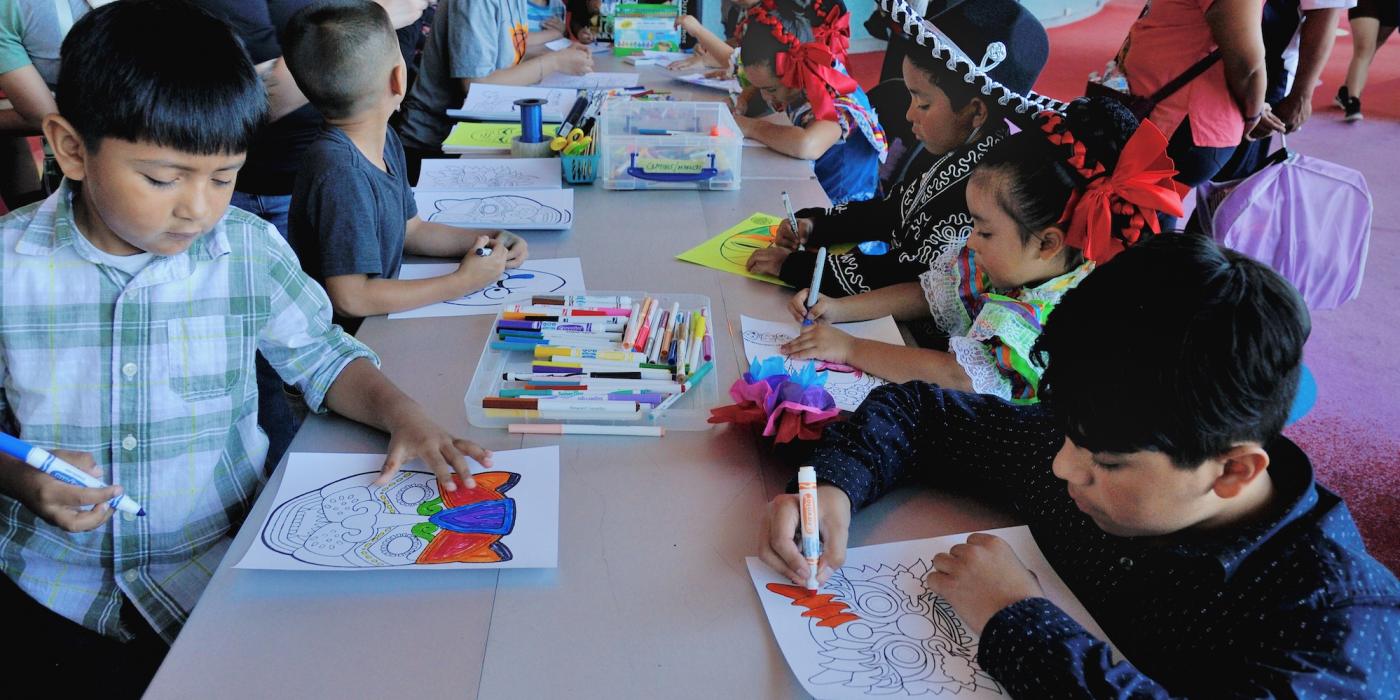 Mask making activity with kids.