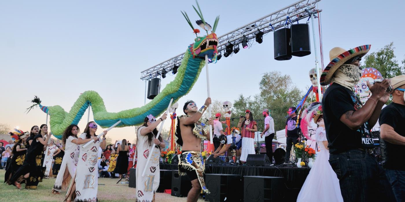 Quetzalcoatl puppet in procession.