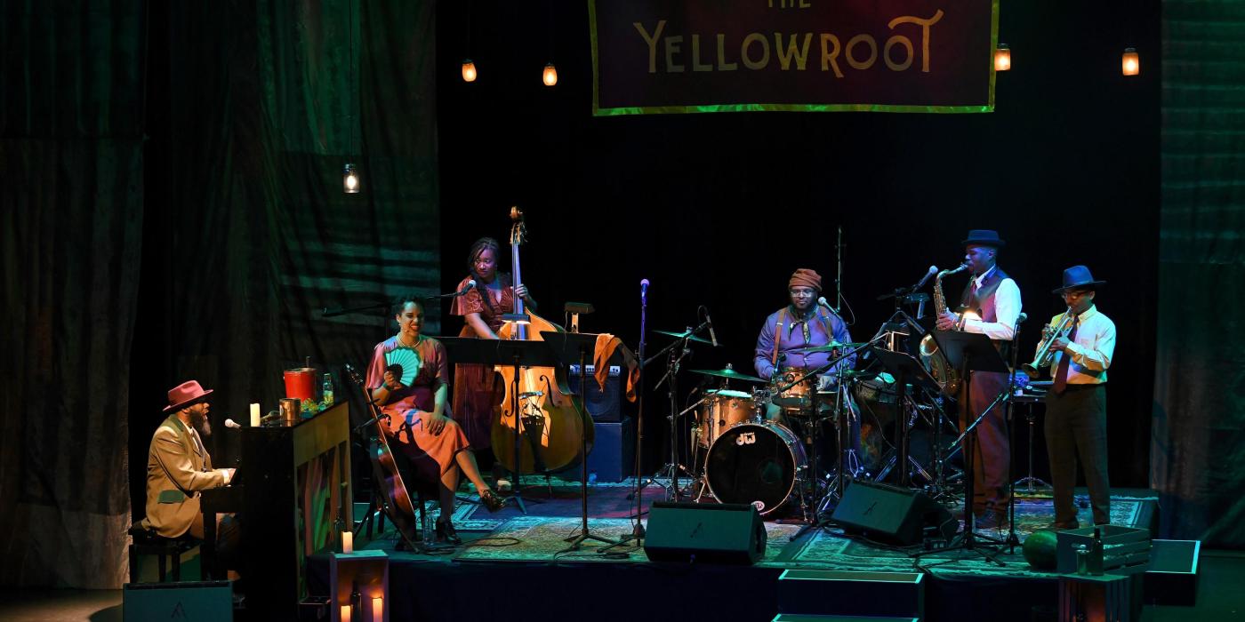 the cast of The Yellowroot performing on stage