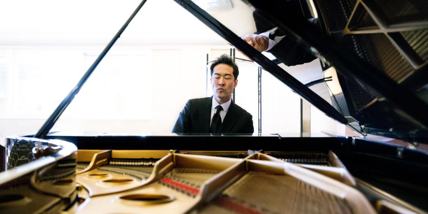 Alpin Hong performs for students at Chandler Center for the Arts