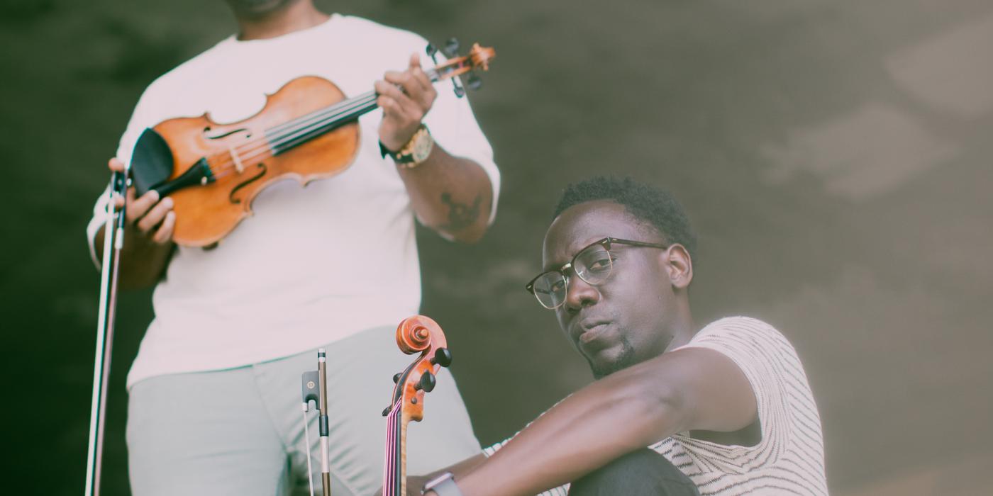 Members of Black Violin posing