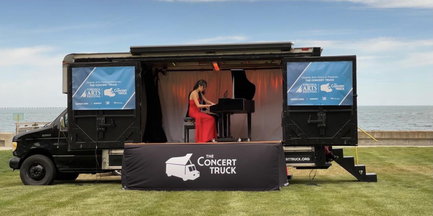 Susan Zhang plays the piano in the Concert Truck