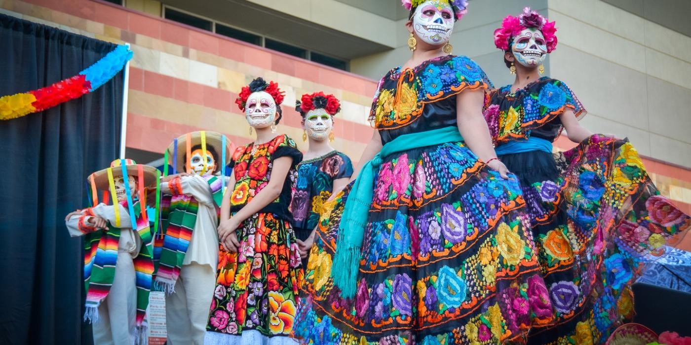 Young girls and boys dressed as day of the dead characters