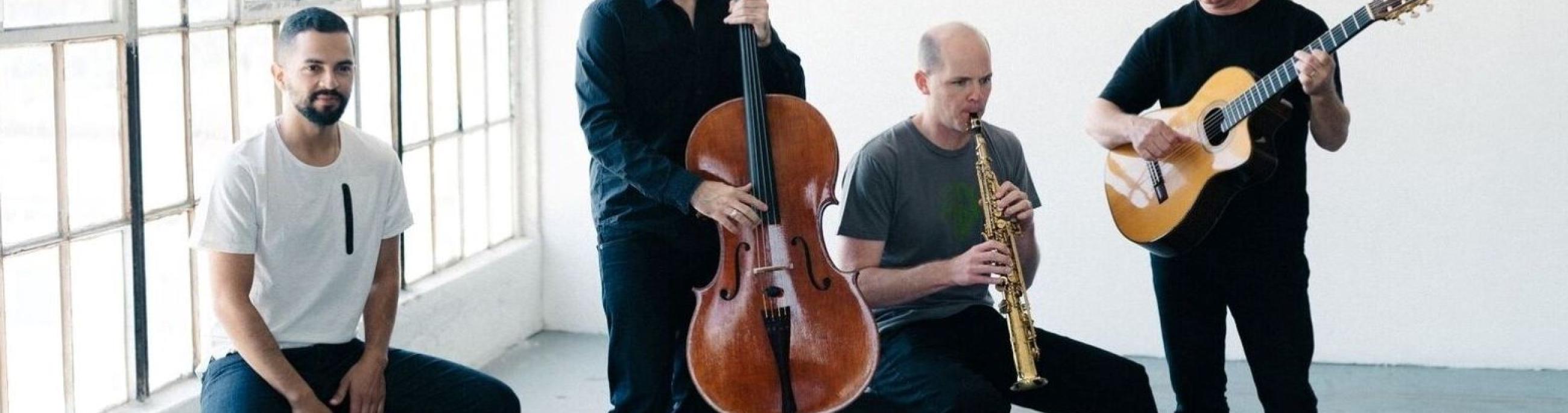 Four members of Quarteto Nuevo perform in a bright, airy industrial loft.