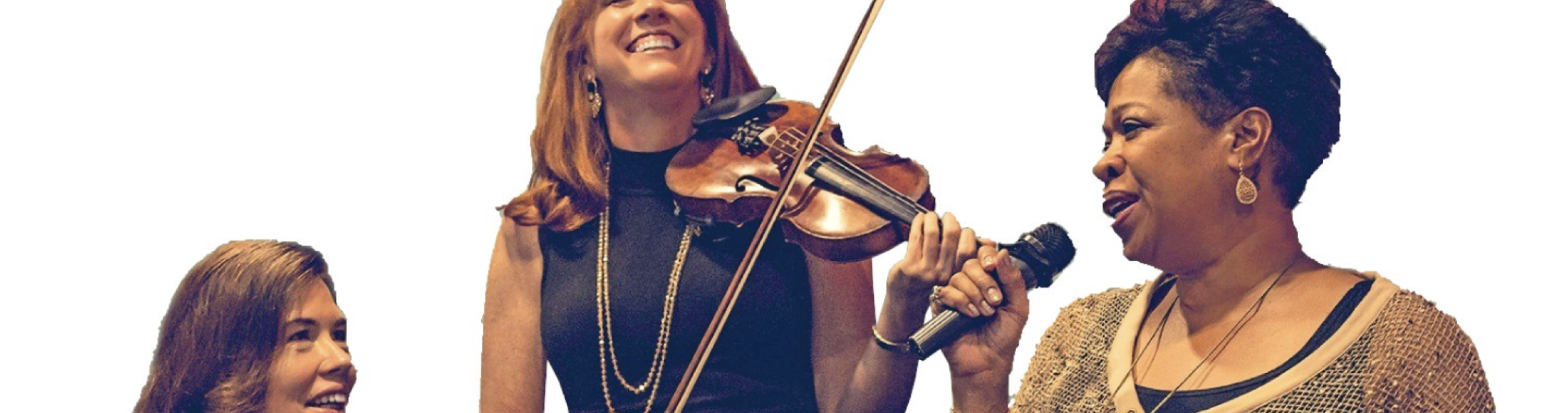 A pianist, violinist, and singer perform in front of a white background.