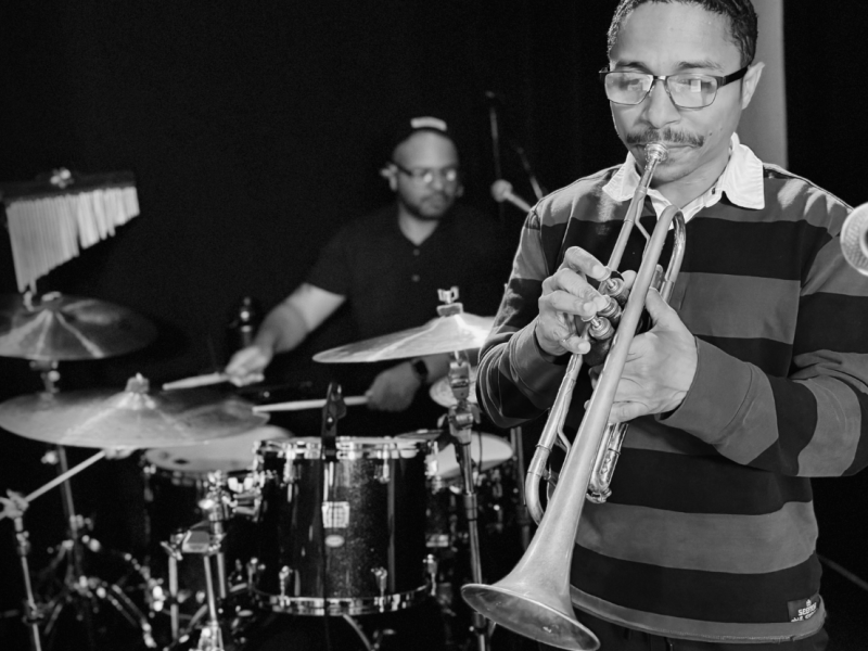 Yellowroot cast playing trumpet and drums