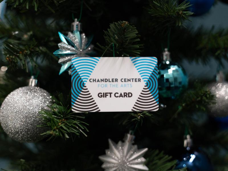 CCA gift card in tree with blue and silver ornaments