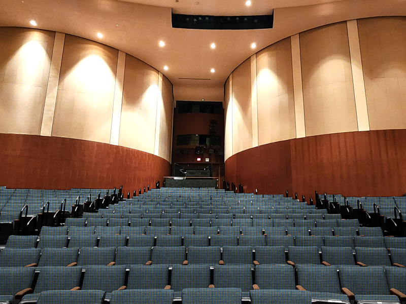 Renovated full theatre rendering with blue seats