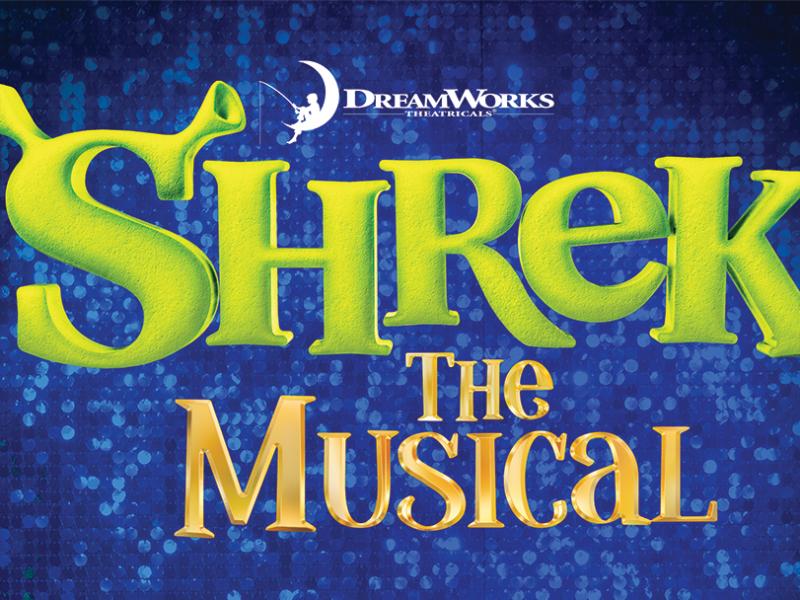 Shrek in green font in front of a sparkly blue textured background