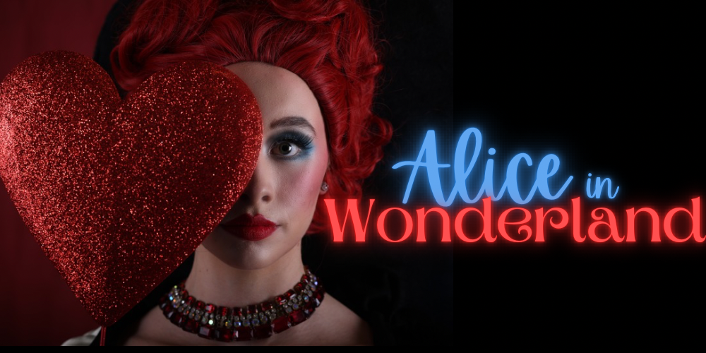 dancer with red hair covered partially with a large red heart