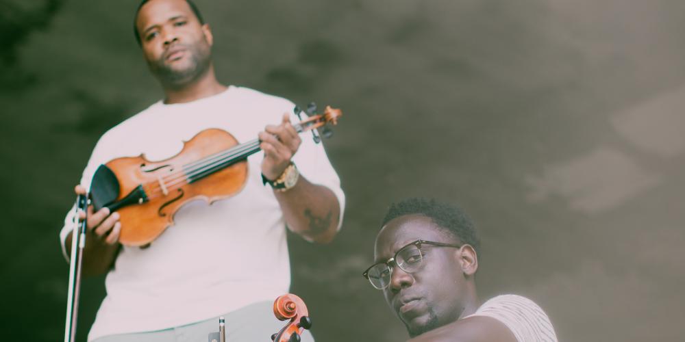 Members of Black Violin posing