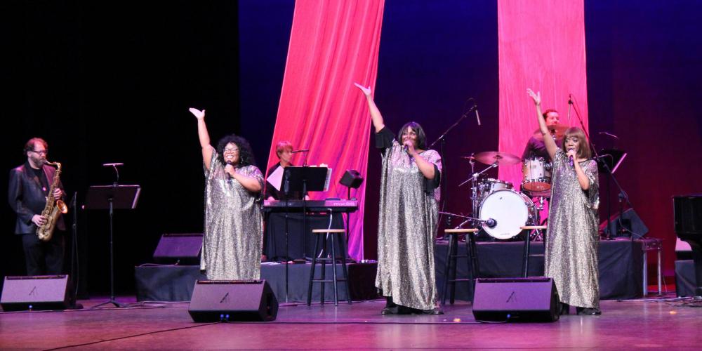 The Legendary Ladies of Soul trio sings on the CCA mainstage in front of the band in shimmering disco gowns.the 
