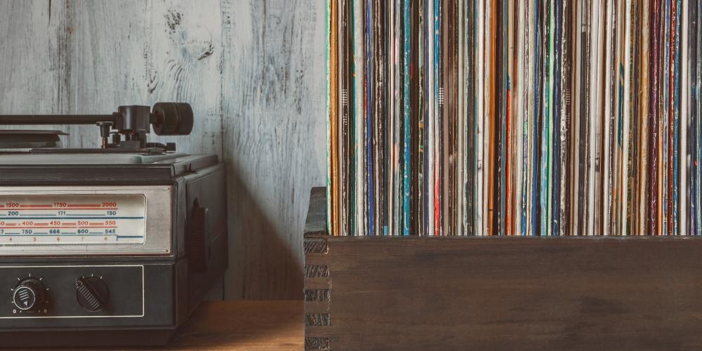 Honoring the more than 400 songs written by Carole King the photo shows a box of records and a record player