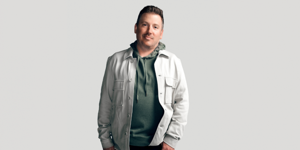 Dave Landau wearing a white jacket 