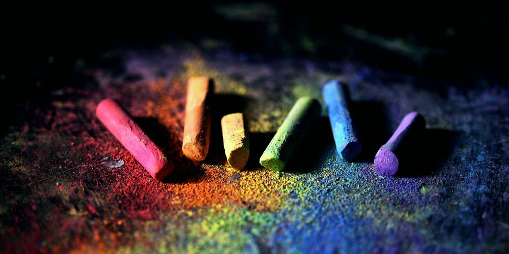 colored chalk ona dark background