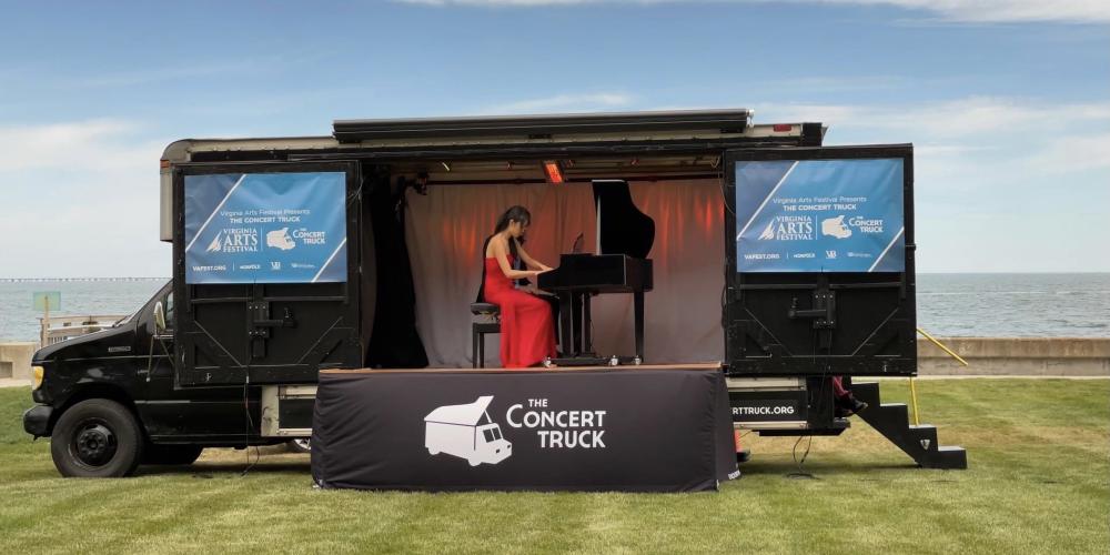 Susan Zhang plays the piano in the Concert Truck