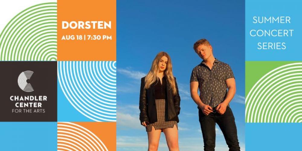 a girl and a guy with blond hair standing in front of a blue sky looking at the camera