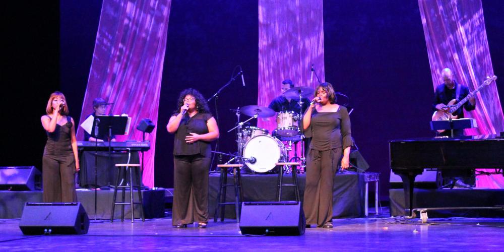 The Legendary Ladies of Soul trio sings on the CCA mainstage in front of the band in black gowns