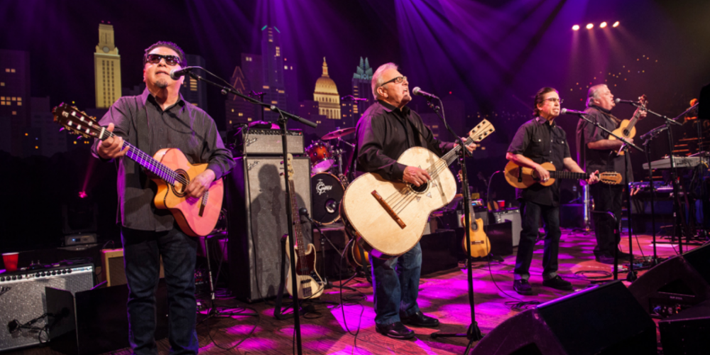 Los Lobos performing on stage