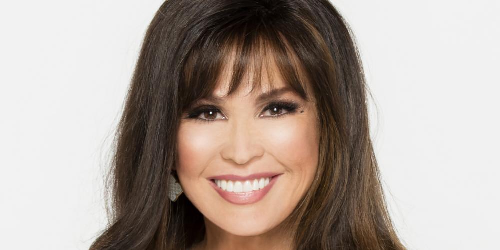 Marie Osmond wearing a white sweater