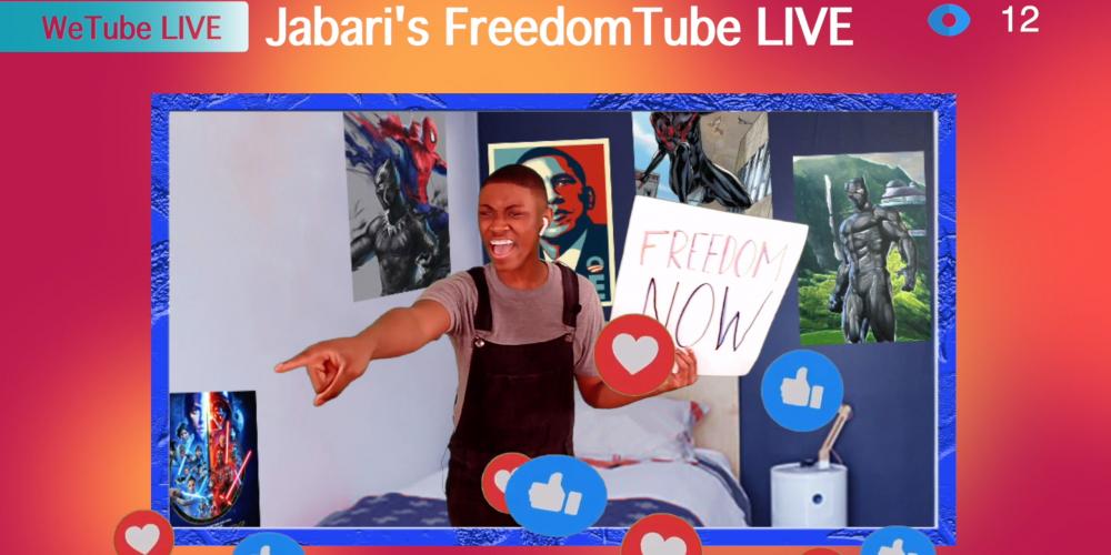 Image of Jabari - a young boy - in his room holding a sign that says "Freedom Now" 