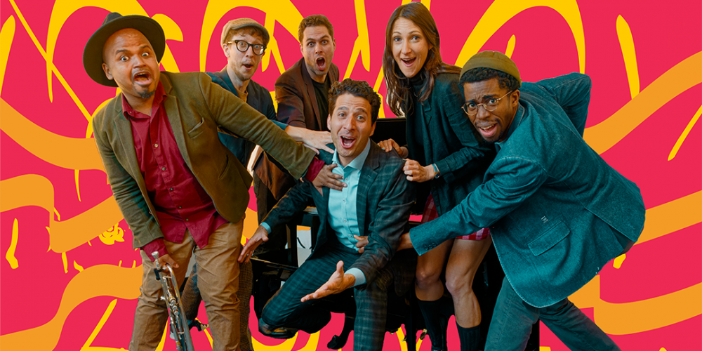 A group of six people are gathered together, looking at the camera with a red and yellow background