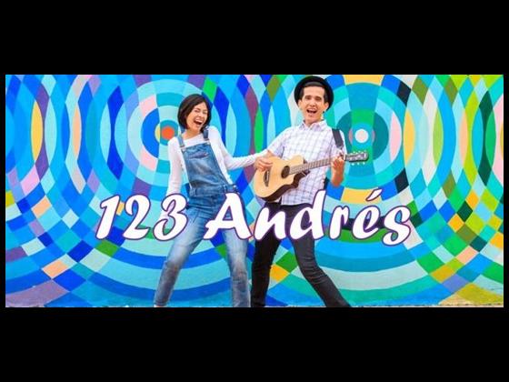 Theatre Kids presents this virtual presentation of 1-2-3 Andrés A young woman and man stand in front of a blue and green background, singing and playing guitar
