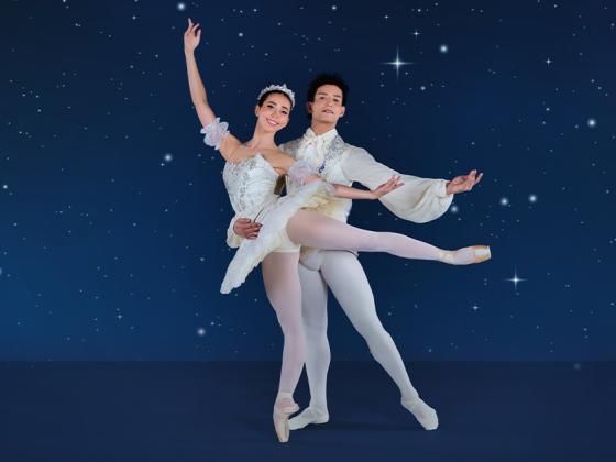 Ballet Under the Stars 2025 Two ballerinas dancing together against a night sky background