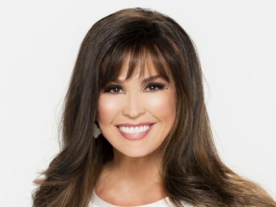 Marie Osmond wearing a white sweater