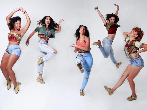 Five women pose in different dance moves from jumping to kicking