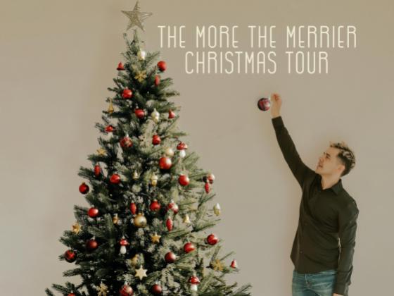 David Archuleta: The More The Merrier Christmas Tour David Archuleta decorating a Christmas tree.
