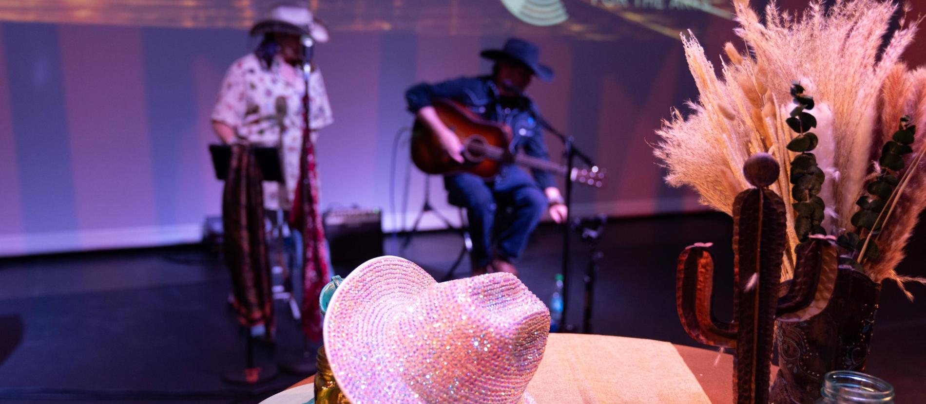 The Blindside Duo plays behind a western centerpiece