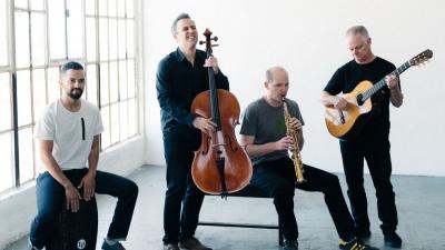 Four members of Quarteto Nuevo perform in a bright, airy industrial loft.