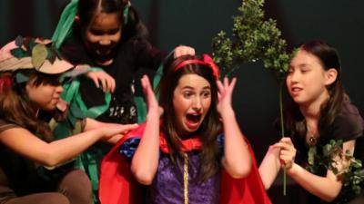 Children perform "Snow White" in costume at a CCA Kids Camp.