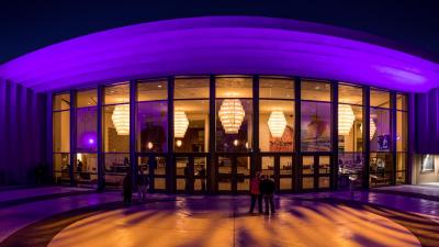 Chandler Center for the Arts exterior lit up with purple lights